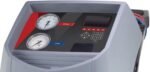 Close-up view of a Robinair A/C recovery machine control panel featuring high and low pressure gauges, keypad controls, and a digital display for precise automotive HVAC diagnostics