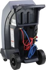 Rear view of a Robinair automotive A/C recovery machine showing storage compartments, red and blue service hoses, and rugged rear wheels designed for easy mobility in professional shop environments