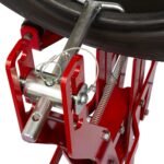 Detail view of the Branick 5045 tire spreader’s locking pin mechanism and adjustable support arm for secure tire positioning
