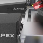 APEX hook-nose lift ramp engaging ramp receiver brackets on a BendPak four-post lift runway