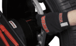 Close-up of the Coats wheel balancer’s Auto Data Arm measuring rim width with precision for fast, accurate balancing results