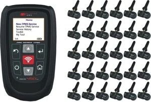 Tire pressure monitoring system kit with handheld diagnostic tool and 24 wireless TPMS sensors arranged beside the scanner