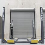 BendPak four post lift for secure car storage. Maximize garage space with trusted lifting power.