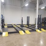 Commercial parking storage with dual platform four post lifts bendPak