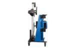 Side profile of the Hofmann 770 wheel aligner showing its compact cabinet, storage, and camera beam assembly.
