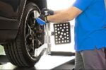 Lightweight AL670XD-400-M wheel clamps designed for quick attachment and secure grip during alignment procedures