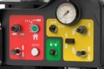 Control panel on the Hofmann Monty 1675-SS tire changer featuring color-coded pneumatic controls and integrated pressure gauge