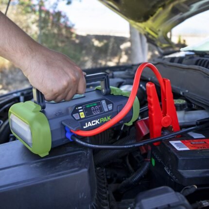 JackPak Ultra 2500A jump starter with removable clamps in action