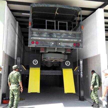 BendPak HDS-40X 5175178 lifting large military vehicles with 40,000-lb heavy-duty capacity.