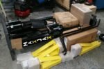 MaxJax M6 portable car lift package contents including columns, arms, and power unit.