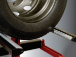 Steel rollers on the QSP LM-500 tire lift allowing heavy tires to rotate smoothly for precise lug nut alignment