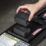 Dimpled stackable rubber lift blocks designed for the QuickJack 6000TL portable car lift to protect vehicle contact points.