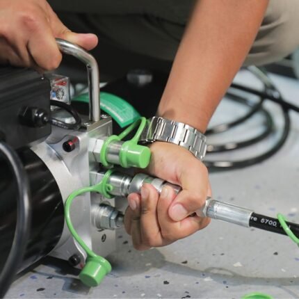 Close-up of the QuickJack BL-3500SLX hydraulic quick-connect fittings for fast setup and teardown. Engineered for leak-free performance and simple operation in any garage environment
