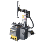 Front-angle view of the Ranger R980XR tire changer highlighting its swing-arm tower, rugged turntable, and heavy-duty foot-pedal controls