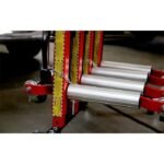Close-up view of Ranger GoCart wheel dollies secured on the storage stand, highlighting the aluminum rollers, safety chains, and durable construction designed for professional shop use