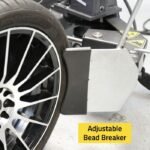 The Ranger R76ATR’s adjustable bead breaker offers precise positioning and strong sidewall force to safely separate beads from wheels of various sizes