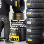 The R76ATR-L 110V tire changer in action inside a high-volume tire shop, optimized for rapid mounting cycles and demanding daily service workloads