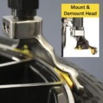 Close-up of the alloy-steel mount and demount head on the R76ATR-L 110V model, engineered for precise tire removal while protecting wheel surfaces