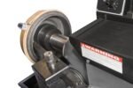 Drum machining configuration showing the RL-8500 brake lathe’s secure mounting and precision cutting interface.