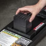 Stackable dimpled rubber lift blocks provide adjustable lifting height and secure contact points for QuickJack systems.